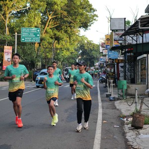 Race photo from BAUR RUN 2025