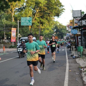 Race photo from BAUR RUN 2025