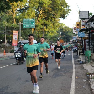 Race photo from BAUR RUN 2025