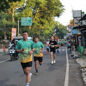 Race photo from BAUR RUN 2025