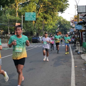 Race photo from BAUR RUN 2025