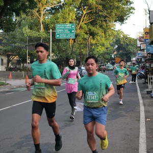 Race photo from BAUR RUN 2025