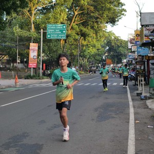 Race photo from BAUR RUN 2025