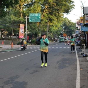 Race photo from BAUR RUN 2025