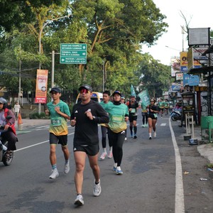 Race photo from BAUR RUN 2025