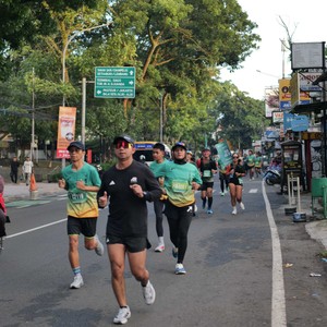 Race photo from BAUR RUN 2025