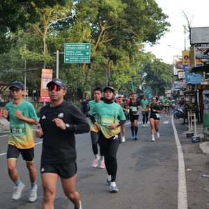 Race photo from BAUR RUN 2025