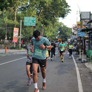 Race photo from BAUR RUN 2025
