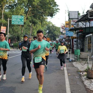 Race photo from BAUR RUN 2025