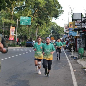 Race photo from BAUR RUN 2025