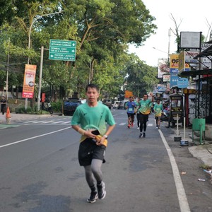 Race photo from BAUR RUN 2025