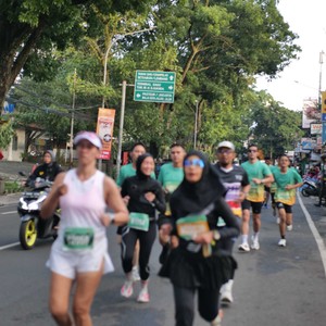 Race photo from BAUR RUN 2025