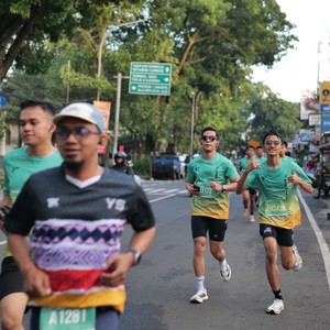Race photo from BAUR RUN 2025