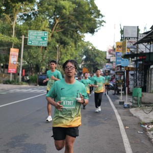 Race photo from BAUR RUN 2025