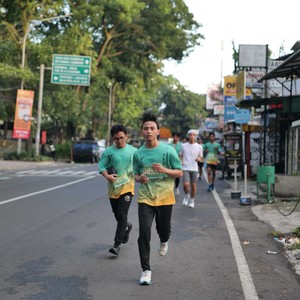Race photo from BAUR RUN 2025