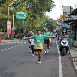 Race photo from BAUR RUN 2025