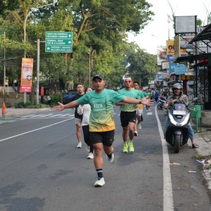 Race photo from BAUR RUN 2025