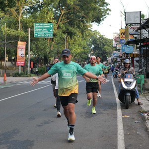 Race photo from BAUR RUN 2025