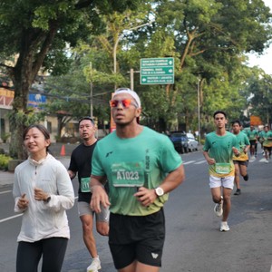 Race photo from BAUR RUN 2025