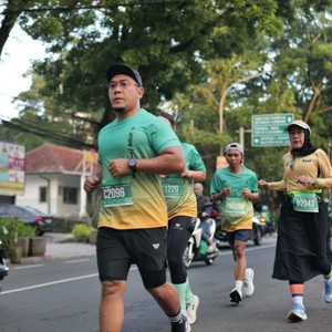 Race photo from BAUR RUN 2025