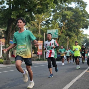 Race photo from BAUR RUN 2025