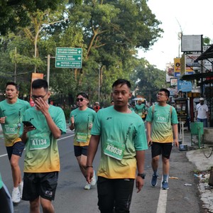 Race photo from BAUR RUN 2025