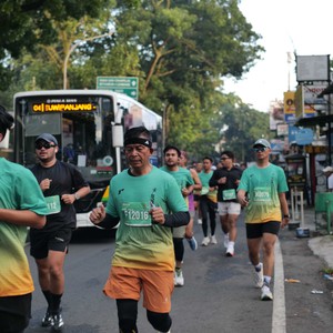 Race photo from BAUR RUN 2025