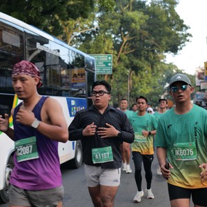 Race photo from BAUR RUN 2025