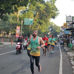 Race photo from BAUR RUN 2025