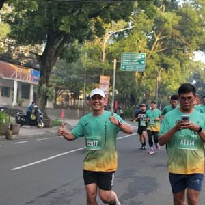 Race photo from BAUR RUN 2025