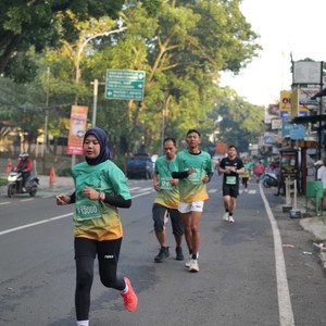 Race photo from BAUR RUN 2025