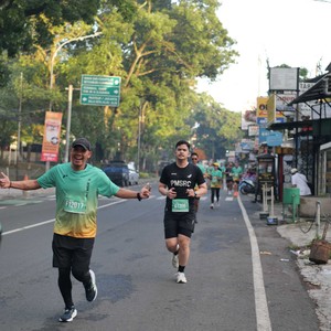 Race photo from BAUR RUN 2025