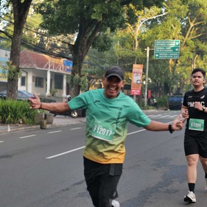Race photo from BAUR RUN 2025