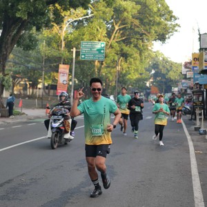 Race photo from BAUR RUN 2025
