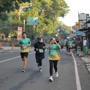 Race photo from BAUR RUN 2025