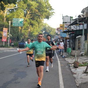 Race photo from BAUR RUN 2025