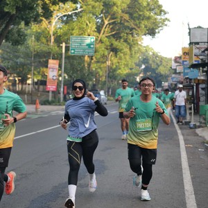Race photo from BAUR RUN 2025