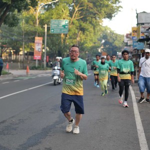 Race photo from BAUR RUN 2025