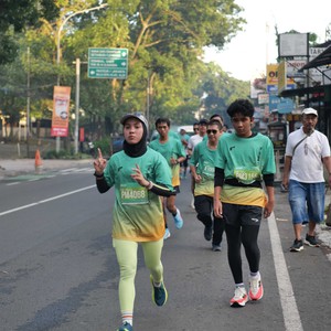 Race photo from BAUR RUN 2025