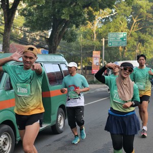 Race photo from BAUR RUN 2025
