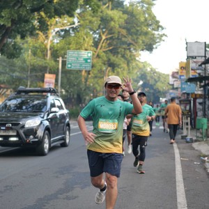 Race photo from BAUR RUN 2025
