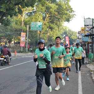 Race photo from BAUR RUN 2025
