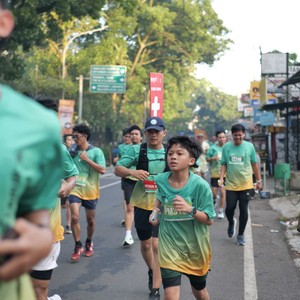 Race photo from BAUR RUN 2025