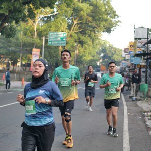 Race photo from BAUR RUN 2025
