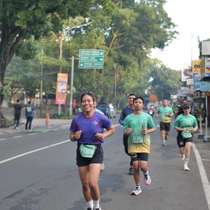 Race photo from BAUR RUN 2025
