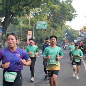 Race photo from BAUR RUN 2025