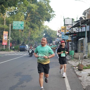 Race photo from BAUR RUN 2025