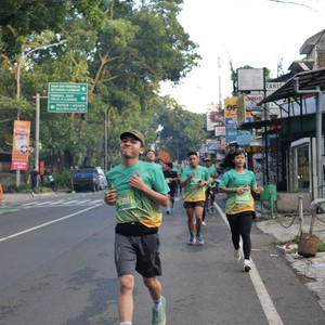Race photo from BAUR RUN 2025