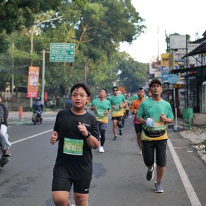 Race photo from BAUR RUN 2025