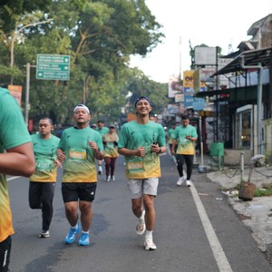 Race photo from BAUR RUN 2025